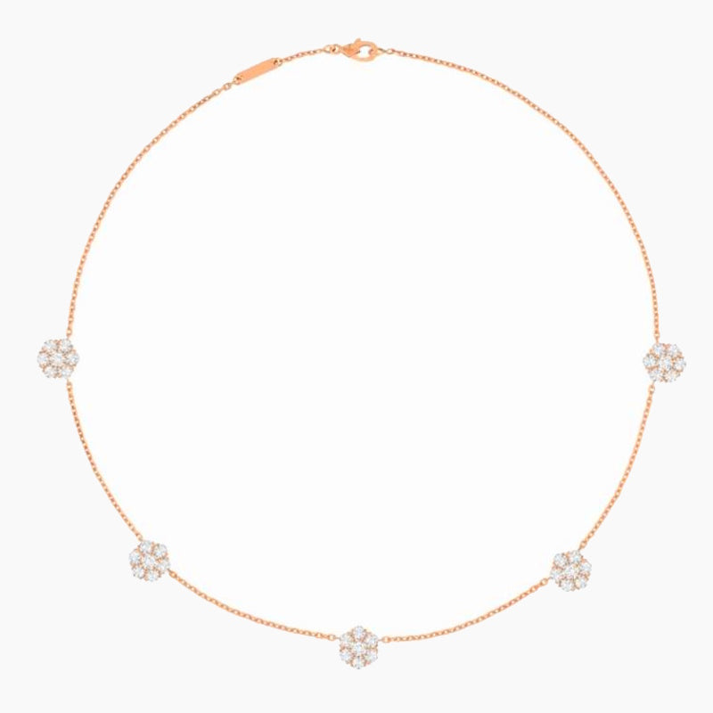 A delicate rose gold chain necklace featuring five small, round cluster floral motifs set with clear stones, displayed on a clean white background.