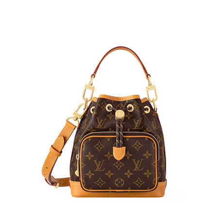 monogram canvas bucket bag with tan leather trim, gold-tone hardware, a top handle, and an adjustable shoulder strap, shown on a plain white background.