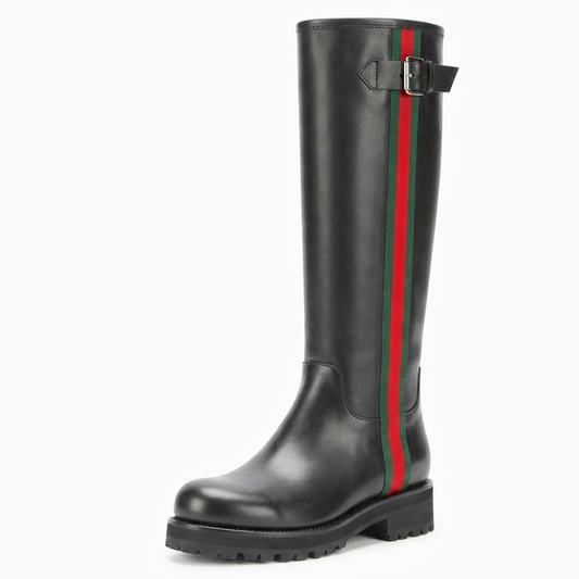 A single black leather knee-high boot with a signature vertical green and red stripe down the side and a buckle strap near the top, shown on a plain white background.