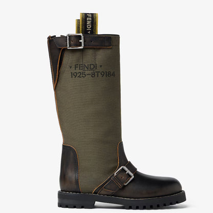 A Fen tall riding boot in olive green canvas and dark brown leather, featuring a black printed serial number and the Fendi logo on the side, with a yellow Fendi pull tab visible at the top.