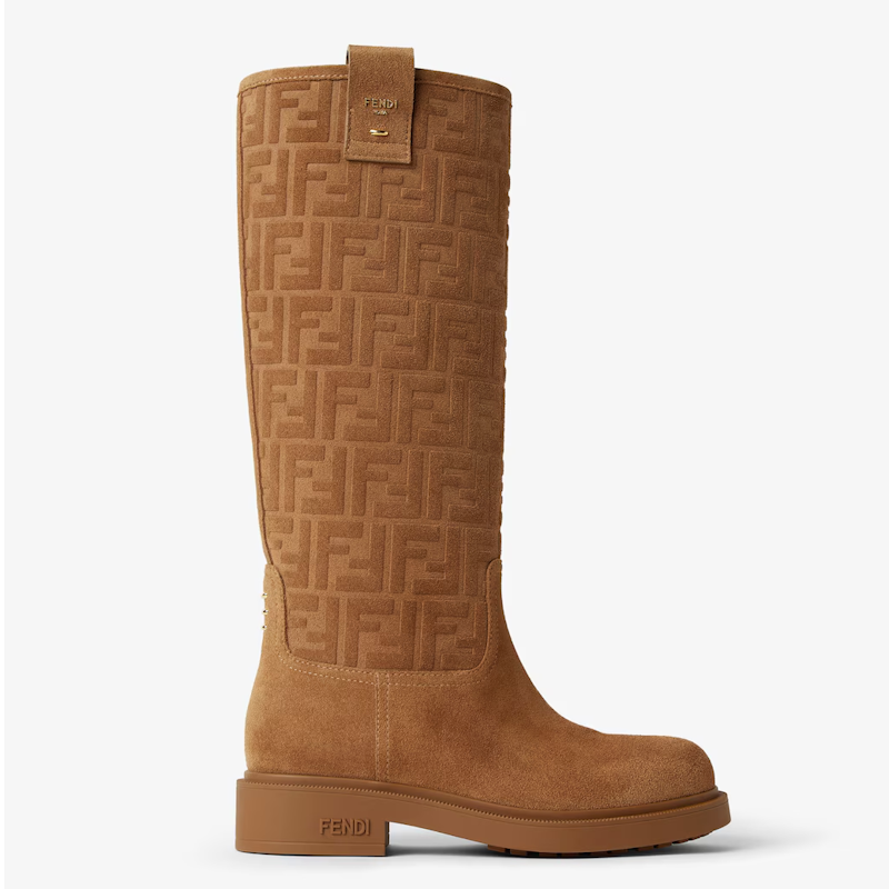 A single knee-high boot in tan suede, featuring the embossed FF logo pattern on the shaft and a low block heel on a light gray background.