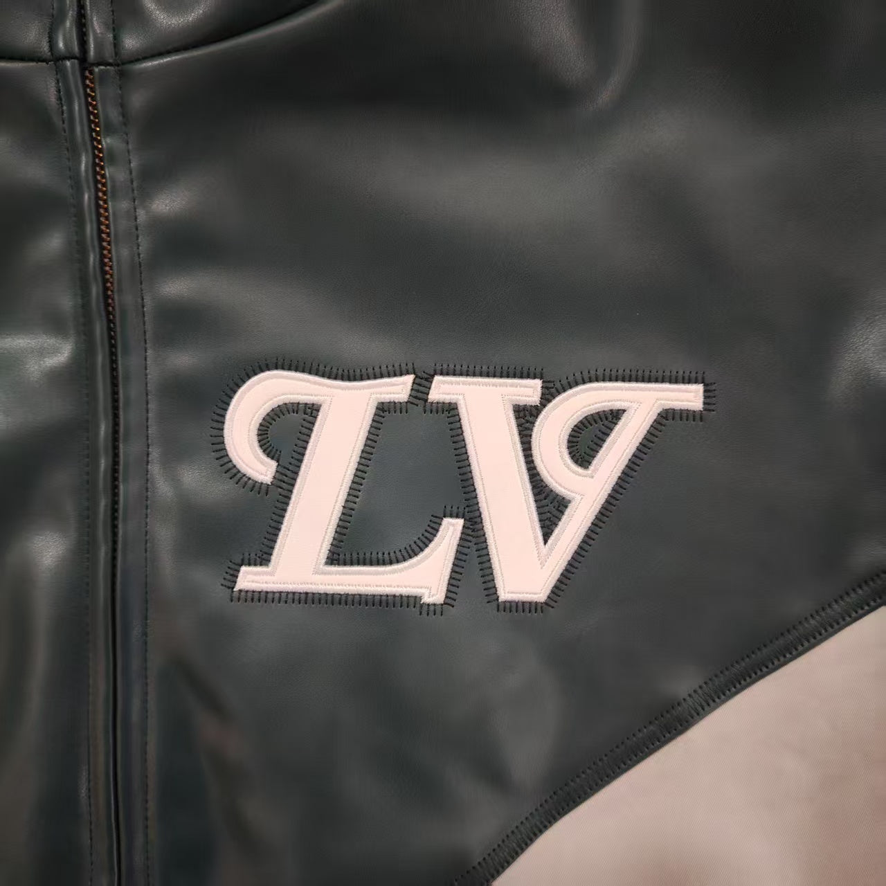 LU  Graphic Leather Mix Tracktop Jacket  IOFF