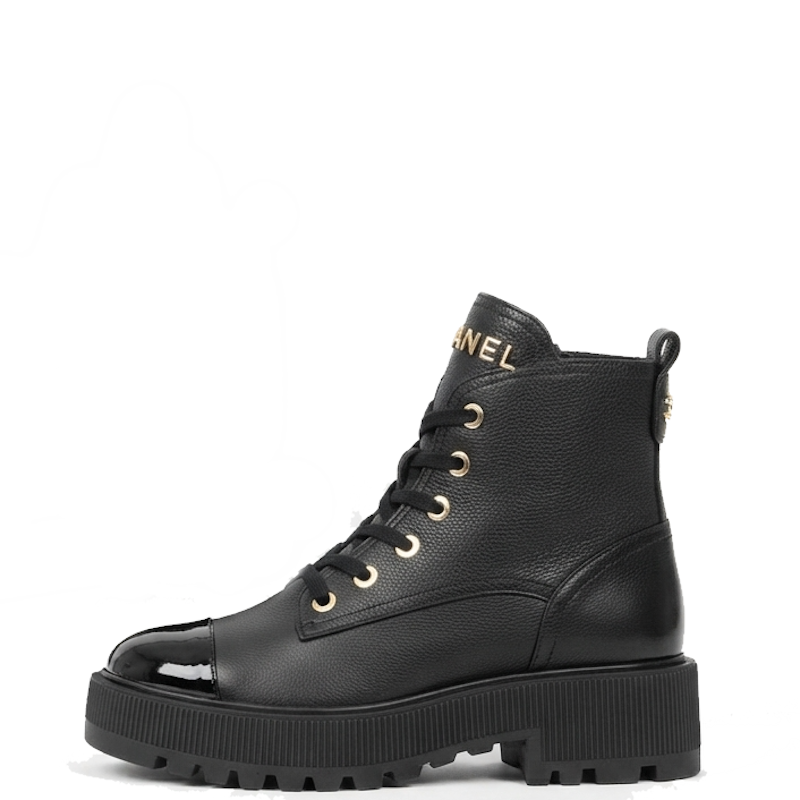 A black leather lace-up ankle boot with a chunky lug sole and a glossy black cap toe, featuring gold-tone hardware and 'Cch' branding on the side collar.