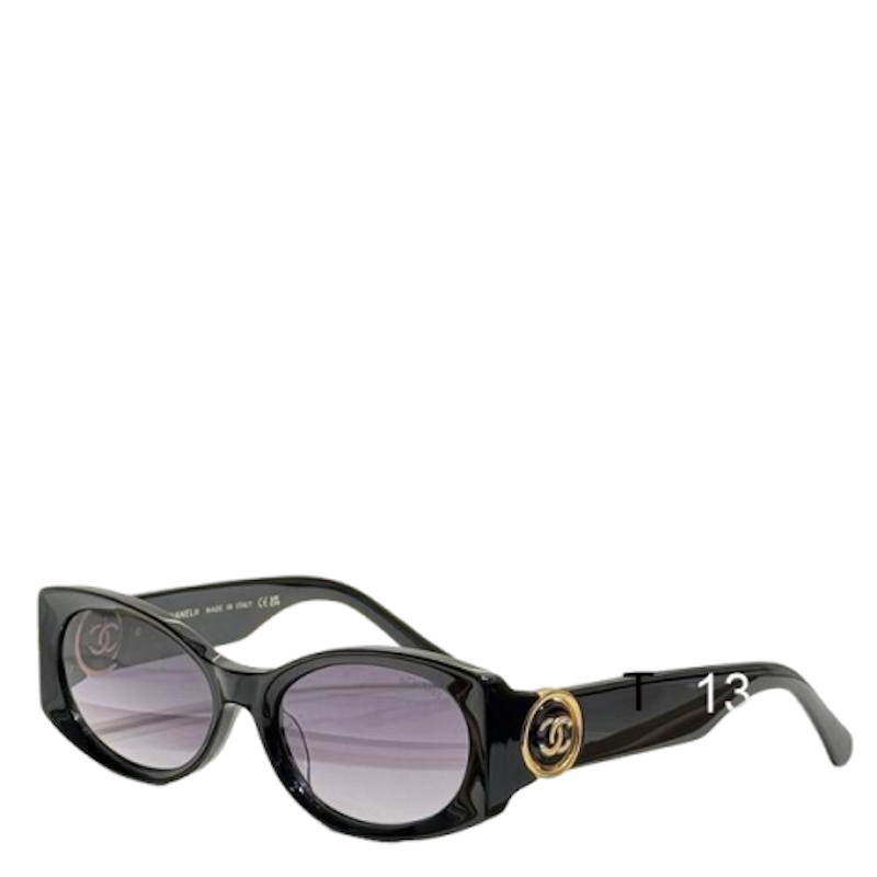 Chanel cat-eye sunglasses with a glossy black acetate frame, gradient gray lenses, a gold-tone CC logo on the front frame, and '' printed on the inner temple arm.