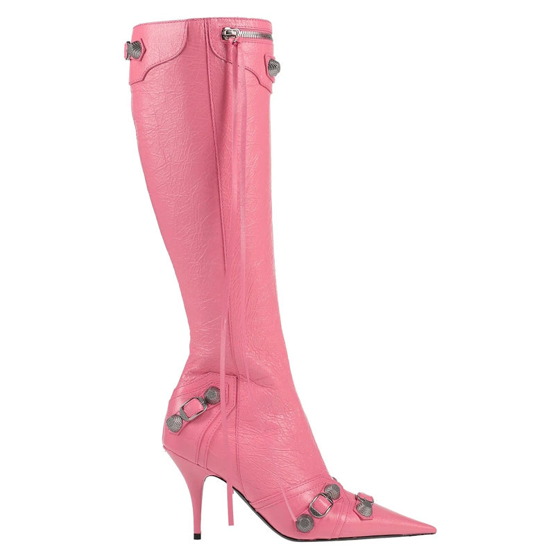A single knee-high pink leather boot with a pointed toe, slim stiletto heel, and multiple silver-tone metal studs and chain details, shown on a plain white background.