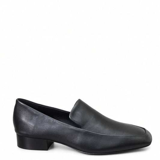 A single black leather slip-on loafer with a low block heel, shown in a side profile on a plain white background.