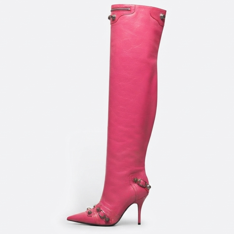 A single bright pink leather over-the-knee boot with pointed toe, high stiletto heel, and decorative silver-tone studs and chain details, shown against a plain light gray background.