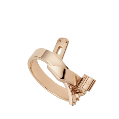 A polished rose gold metal ring with a unique open-ended design, featuring a flat top plate with two small screw details and a matching clasp mechanism on the side, shown against a solid white background.