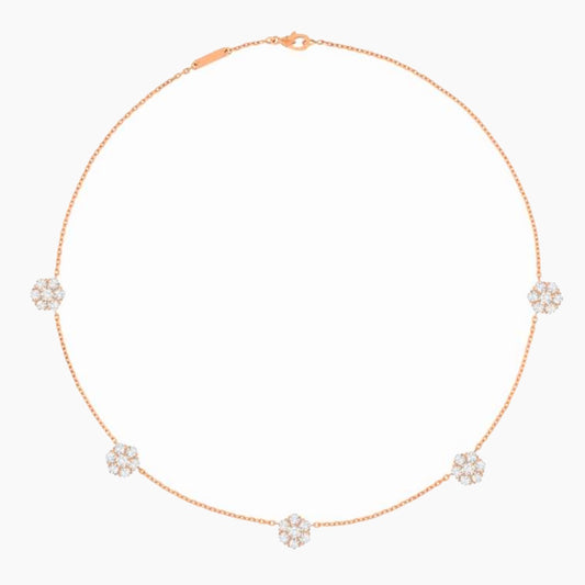 A delicate rose gold chain necklace featuring five small, round cluster floral motifs set with clear stones, displayed on a clean white background.