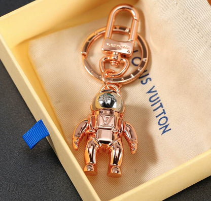 LU Key Charm Buckle Space