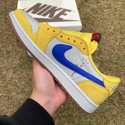 N*KE Travis Sco tt x Jorda AJ 1 Low “Canary” Sneakers