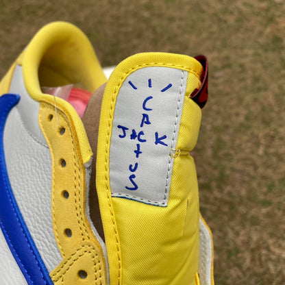 N*KE Travis Sco tt x Jorda AJ 1 Low “Canary” Sneakers