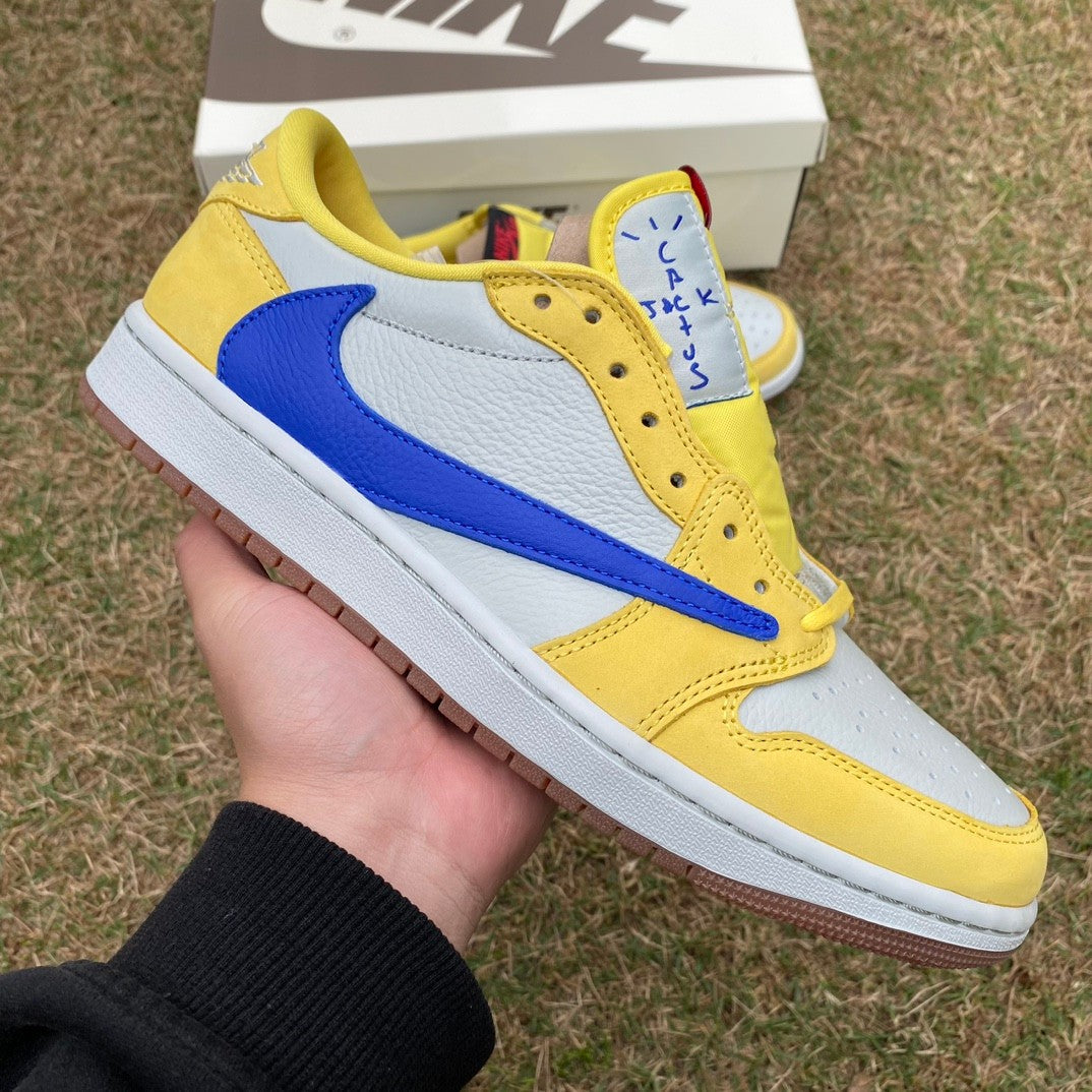 N*KE Travis Sco tt x Jorda AJ 1 Low “Canary” Sneakers