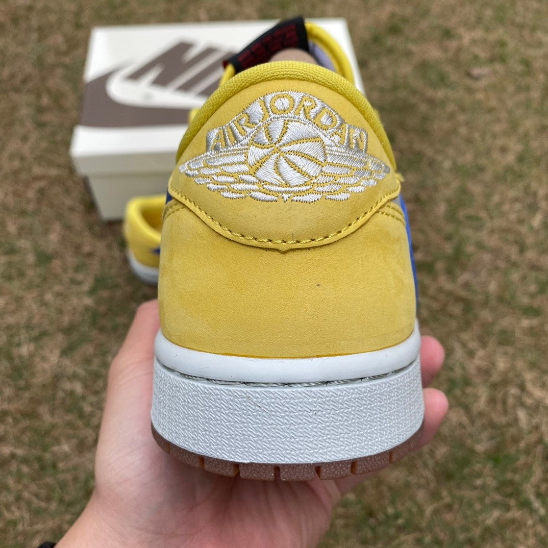 N*KE Travis Sco tt x Jorda AJ 1 Low “Canary” Sneakers