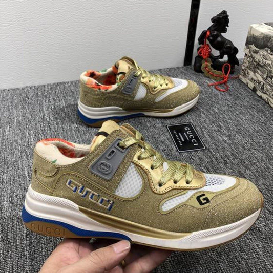 GU Sneakers Gold