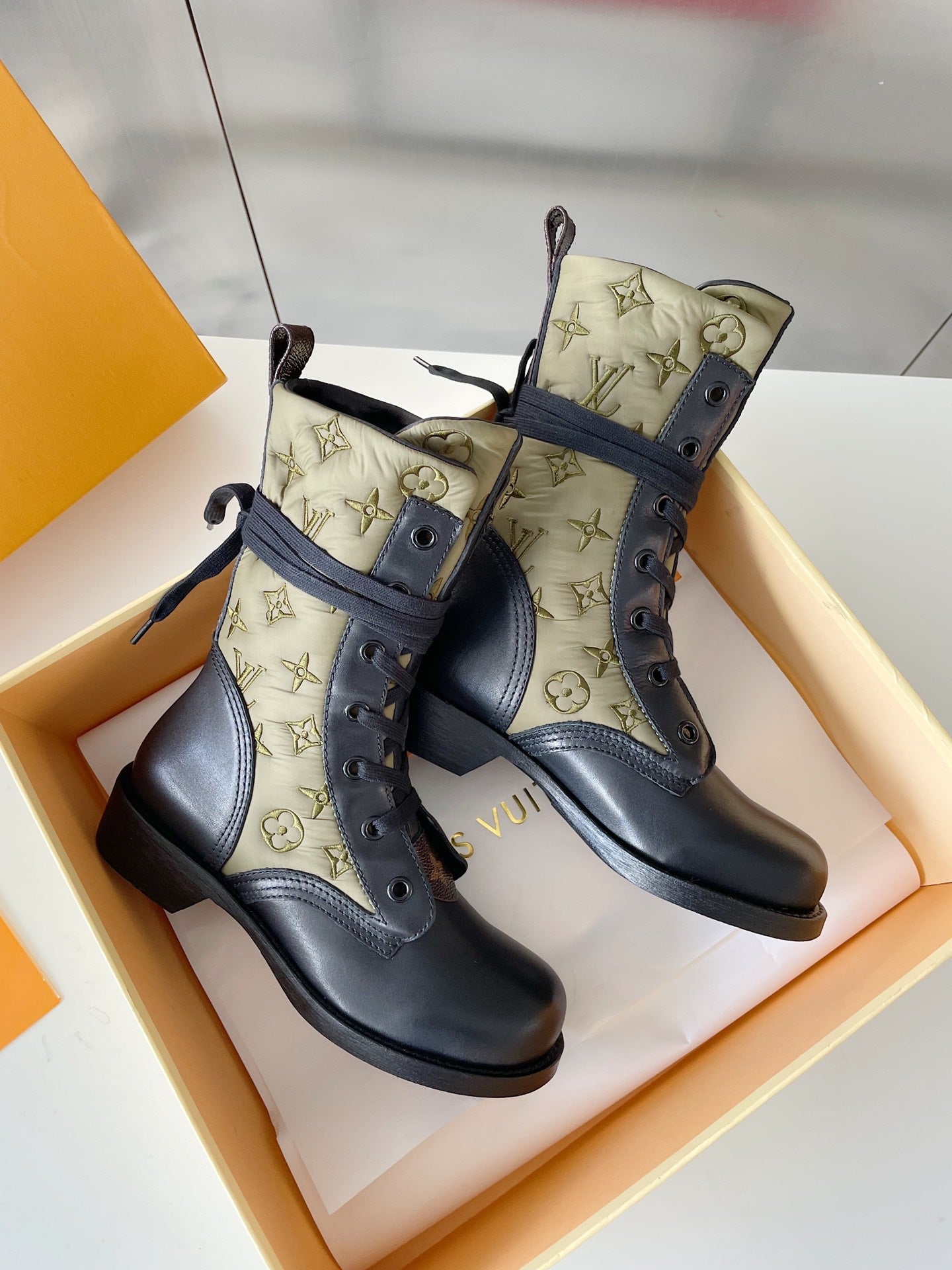 LU  Boots  Monogram