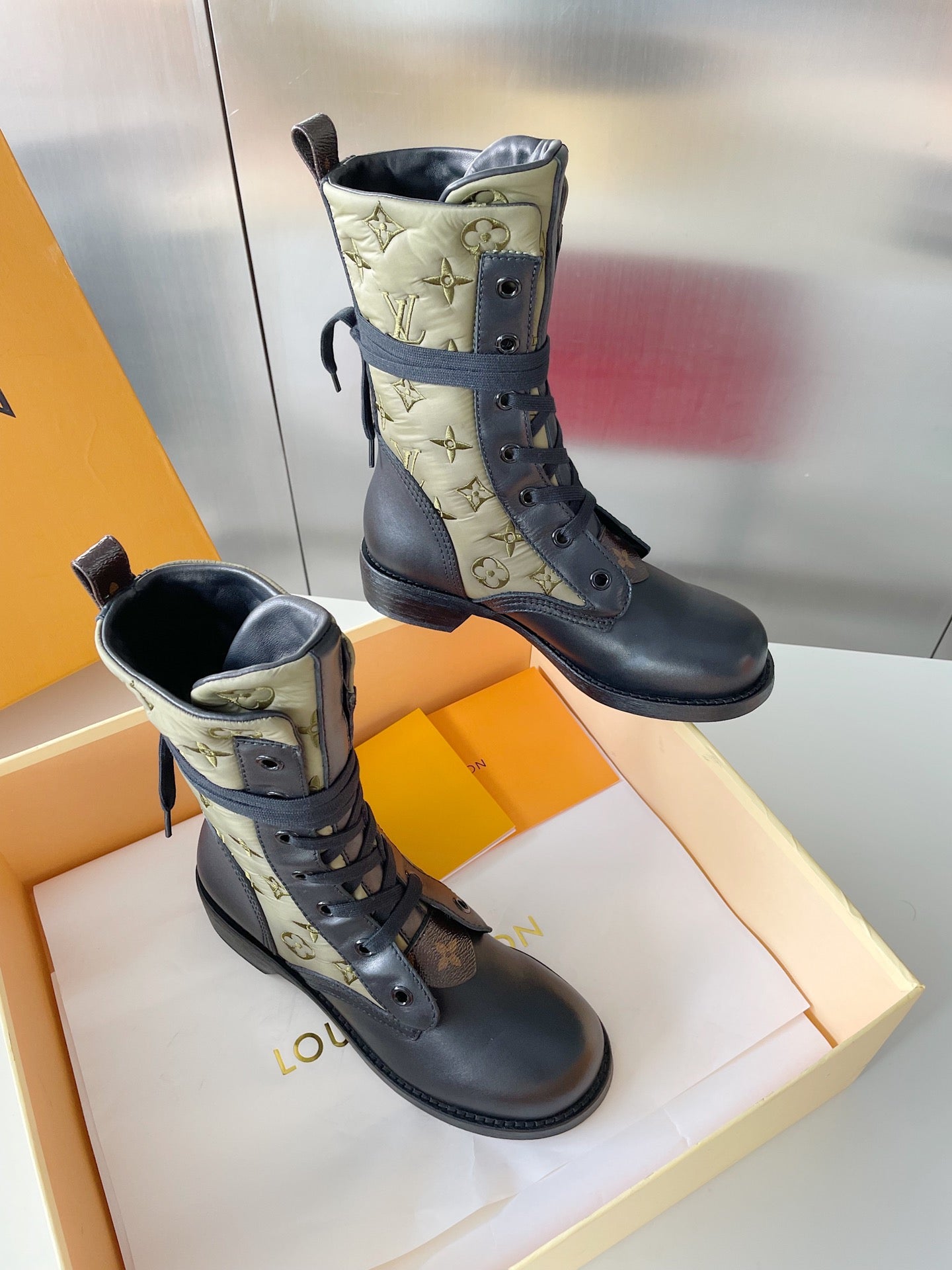 LU  Boots  Monogram