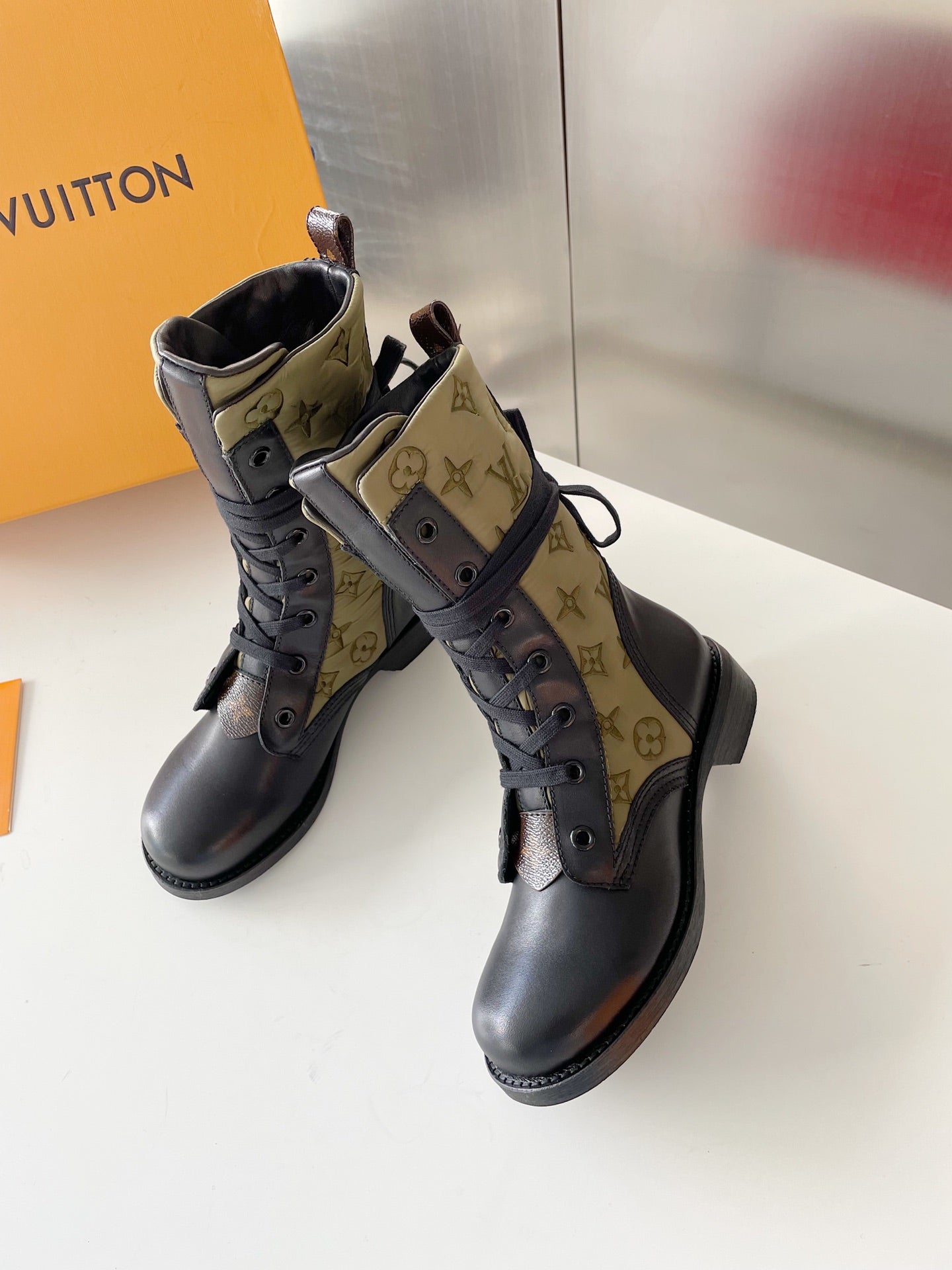 LU  Boots  Monogram