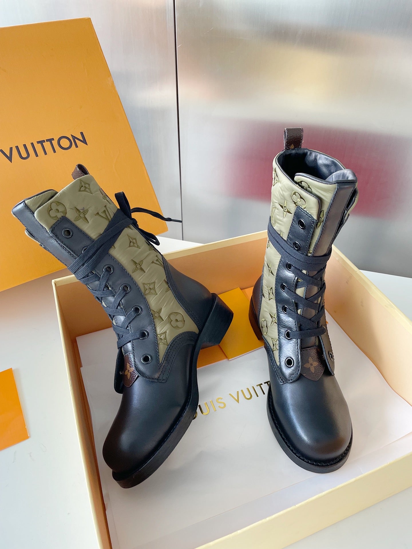LU  Boots  Monogram