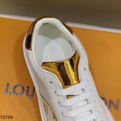 LU Sneakers Gold