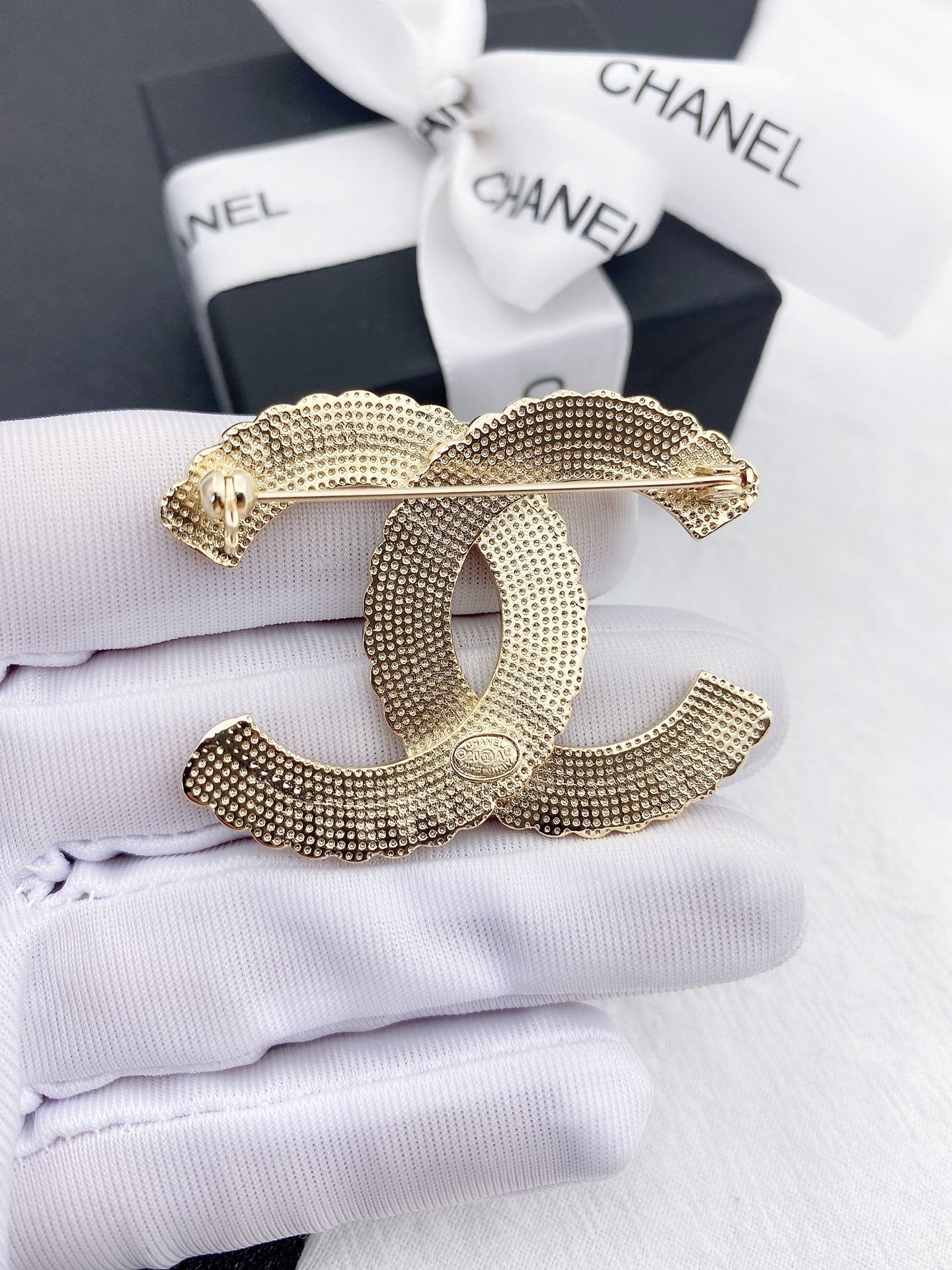 CHL Brooch