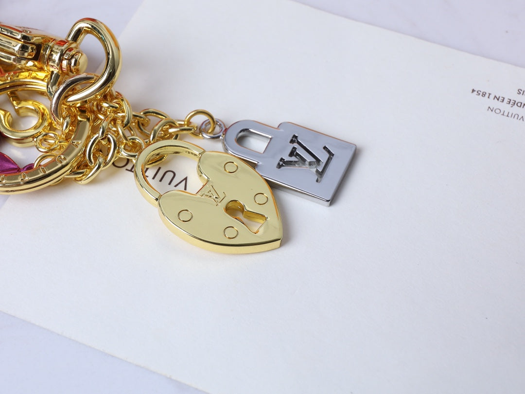 LU Key Buckle Bag  Gold Tone