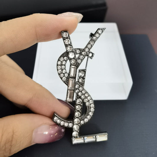 Y L  Brooch